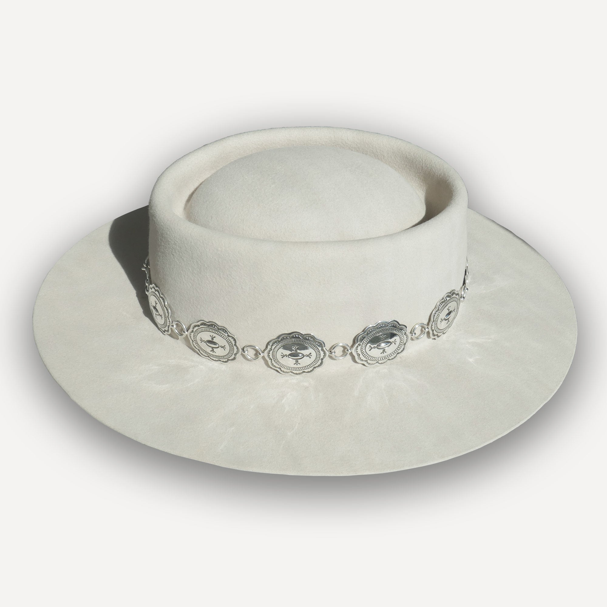 Womens White Western Hat with Sterling Silver Navajo Concho Hat Band on a White Background
