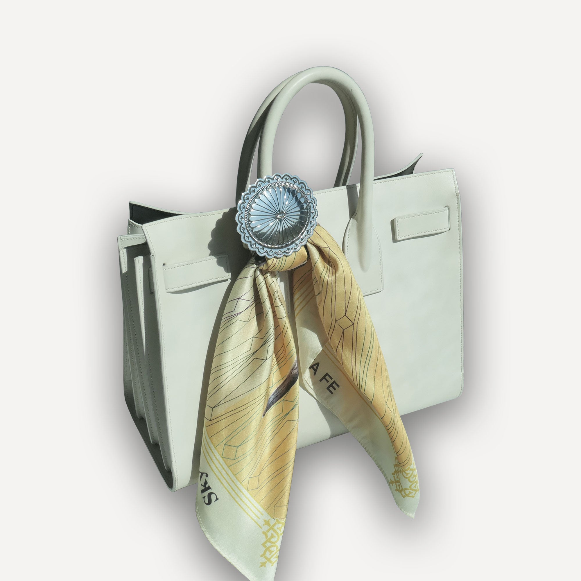 Navajo Slider Concho on White Saint Laurent Purse