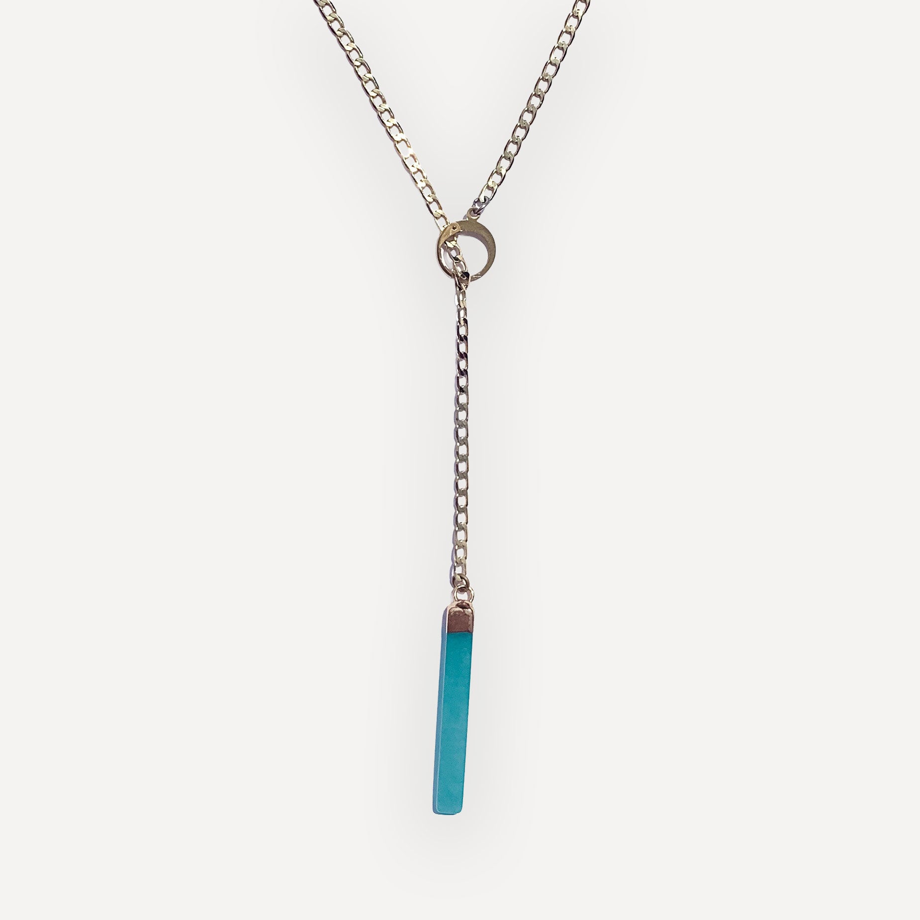 Necklace with a jade bar pendant on a white background