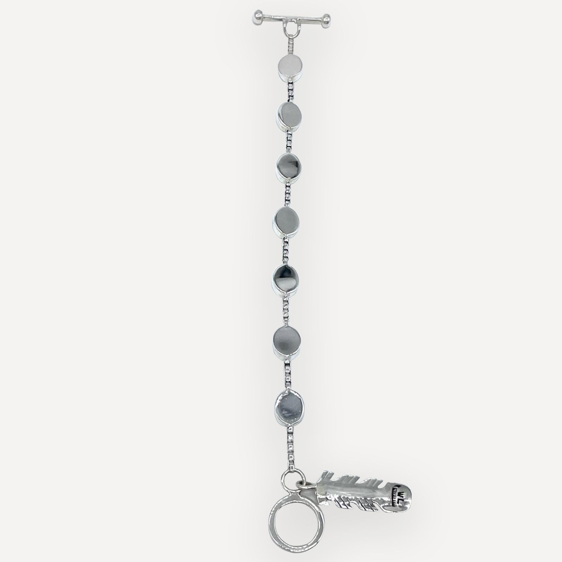 Back of a sterlilng silver bracelet with navajo hallmark