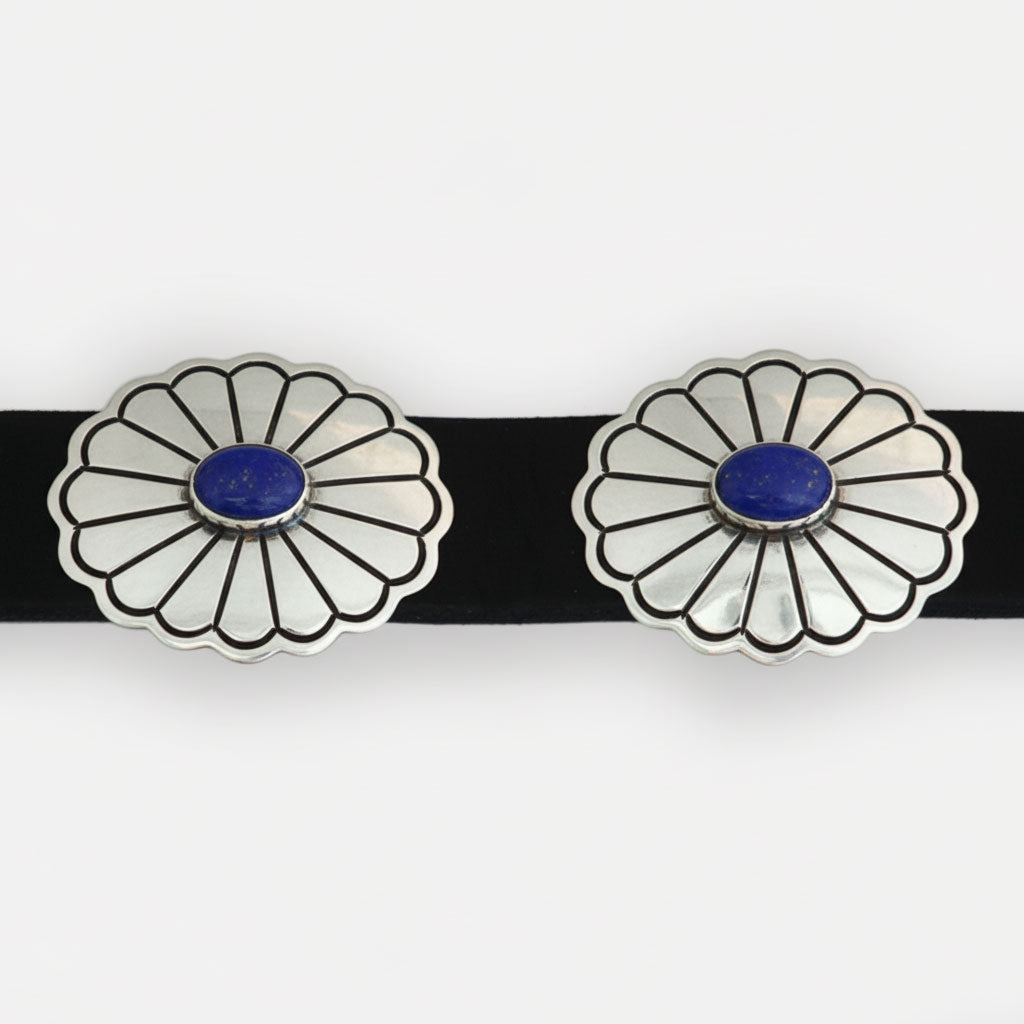 Black leather and sterling silver conchos with lapis blue in center stone.