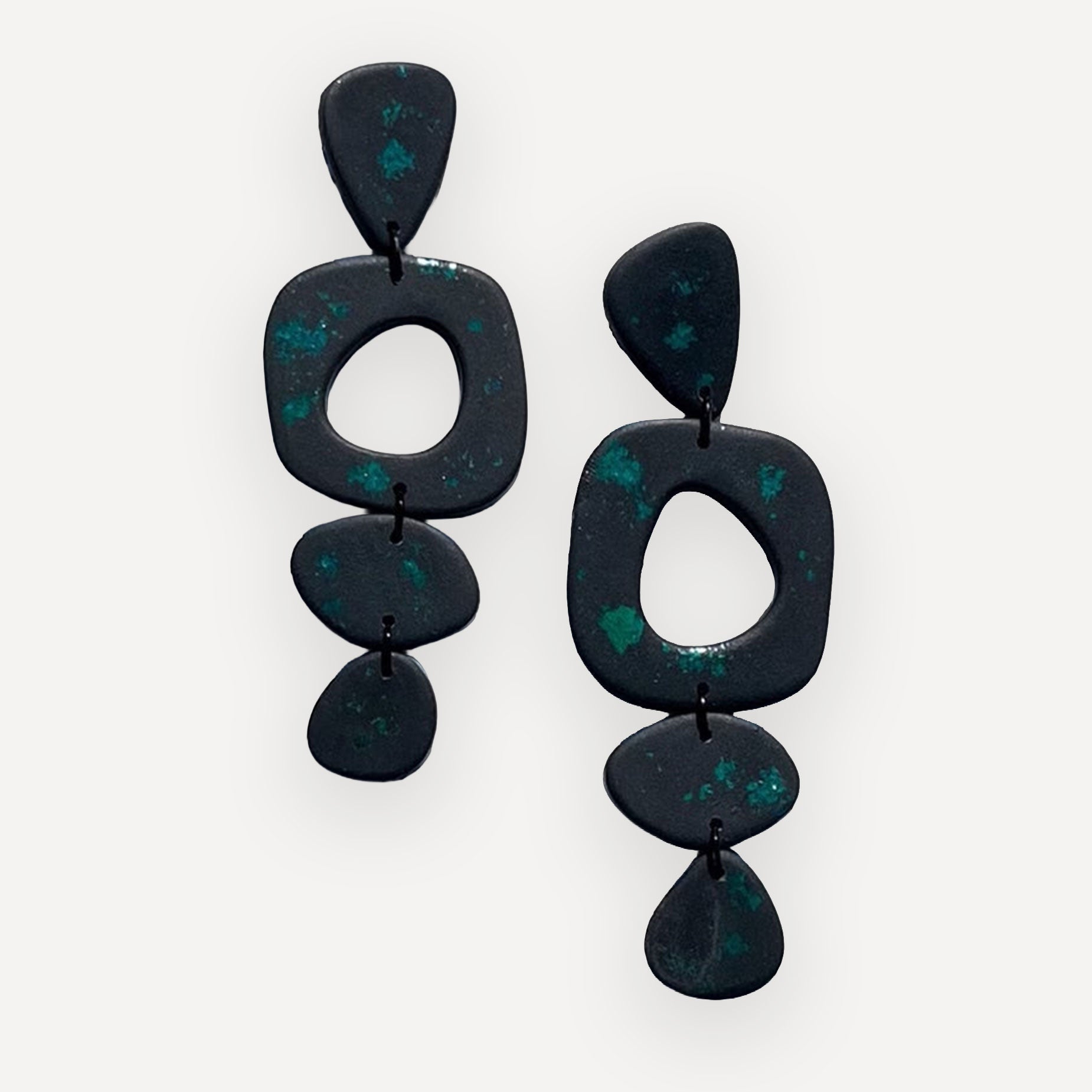Malachite art earrings on white background