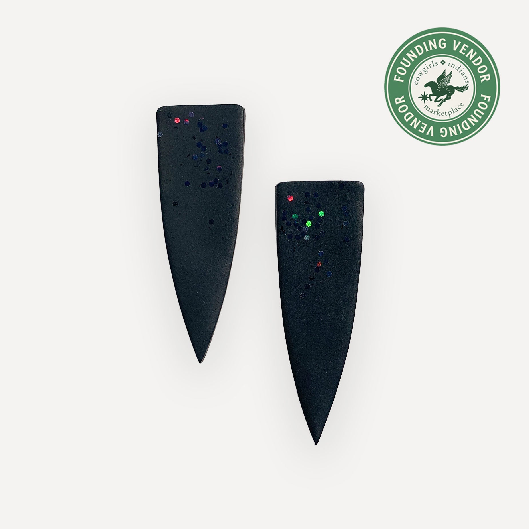 Black earrings with colorful specks on a white background, featuring a 'Founding Vendor' logo.