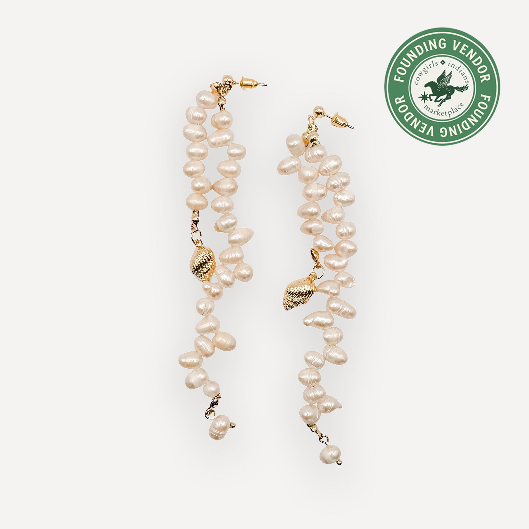 Pearl earrings with gold accents on a white background, featuring a Founding Vendor logo.