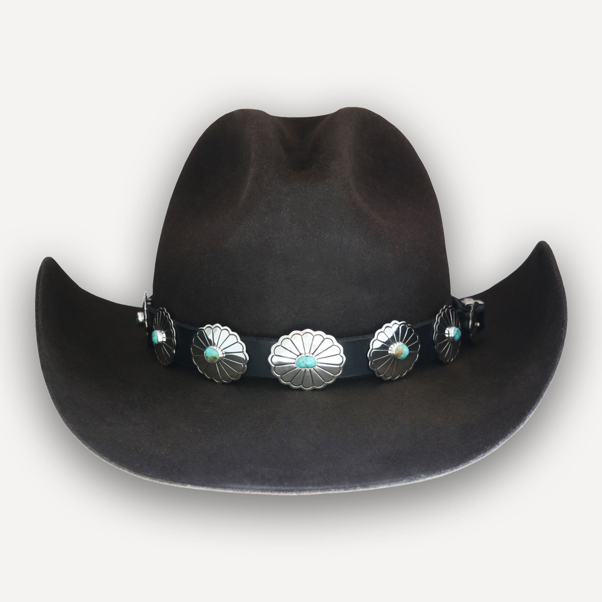 Brown Kemo Sabe cowboy hat with hat band featuring silver conchos and turquoise stones on a white background