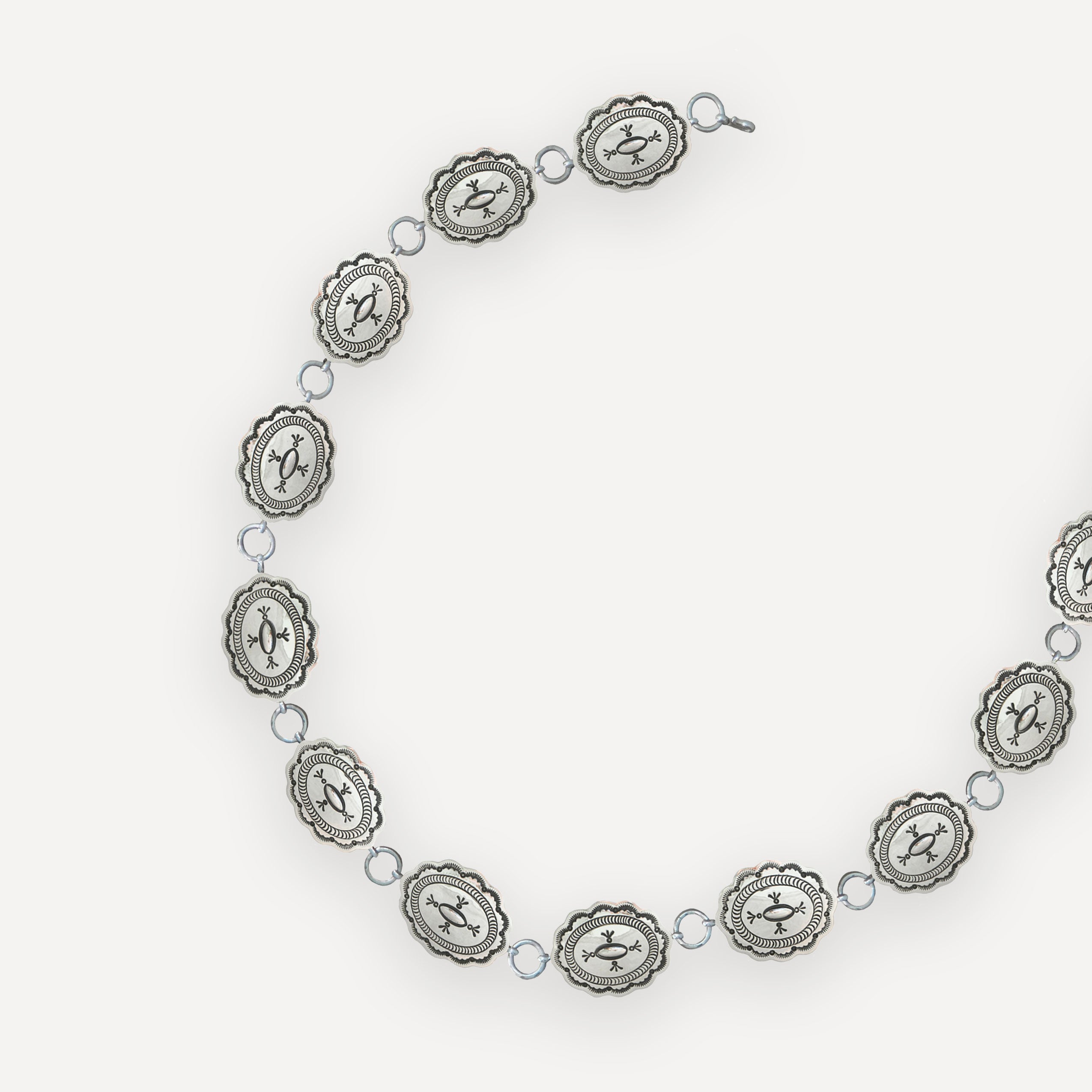 Sterling Silver Concho Link Belt on White Background