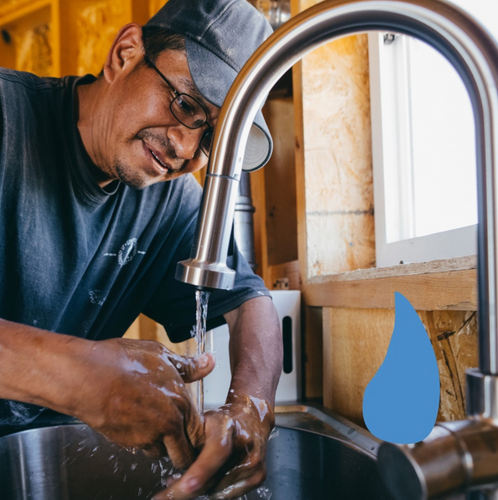 DigDeep Water System Recipient Turning on Water from the Tap for the First Time on the Navajo Reservation 