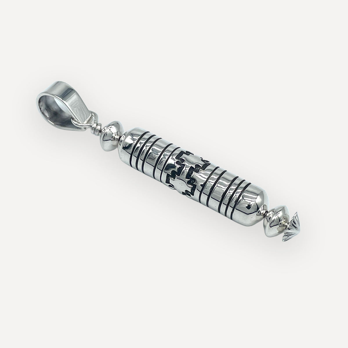 Barrel bead mesa pendant in polished sterling silver on an adjustable black kodiak leather cord