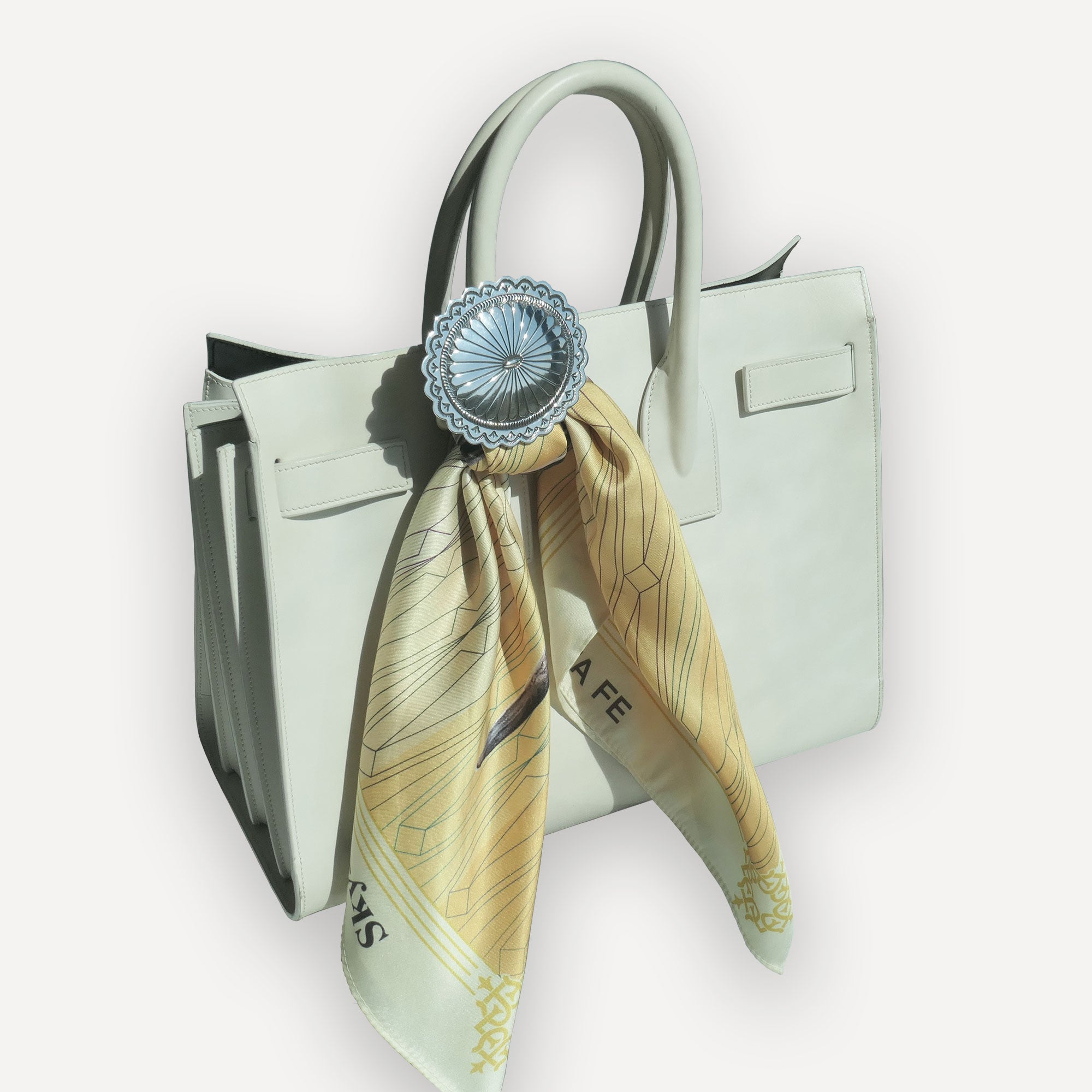 White leather handbag adorned with Sterling Silver Concho and Silk Scarf 