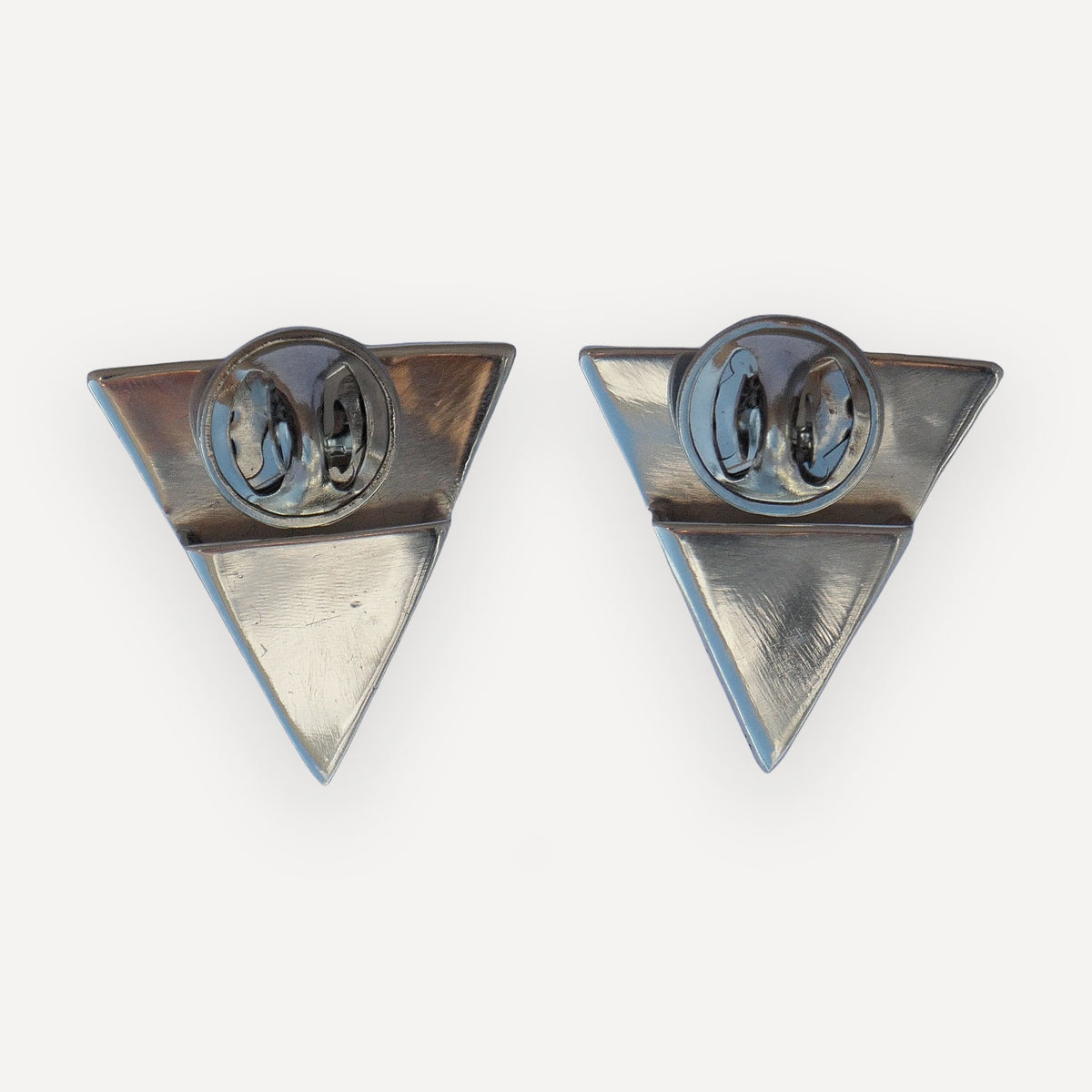 Back of a sterling silver lone star collar tip with Sterling and LC hallmark stamps
