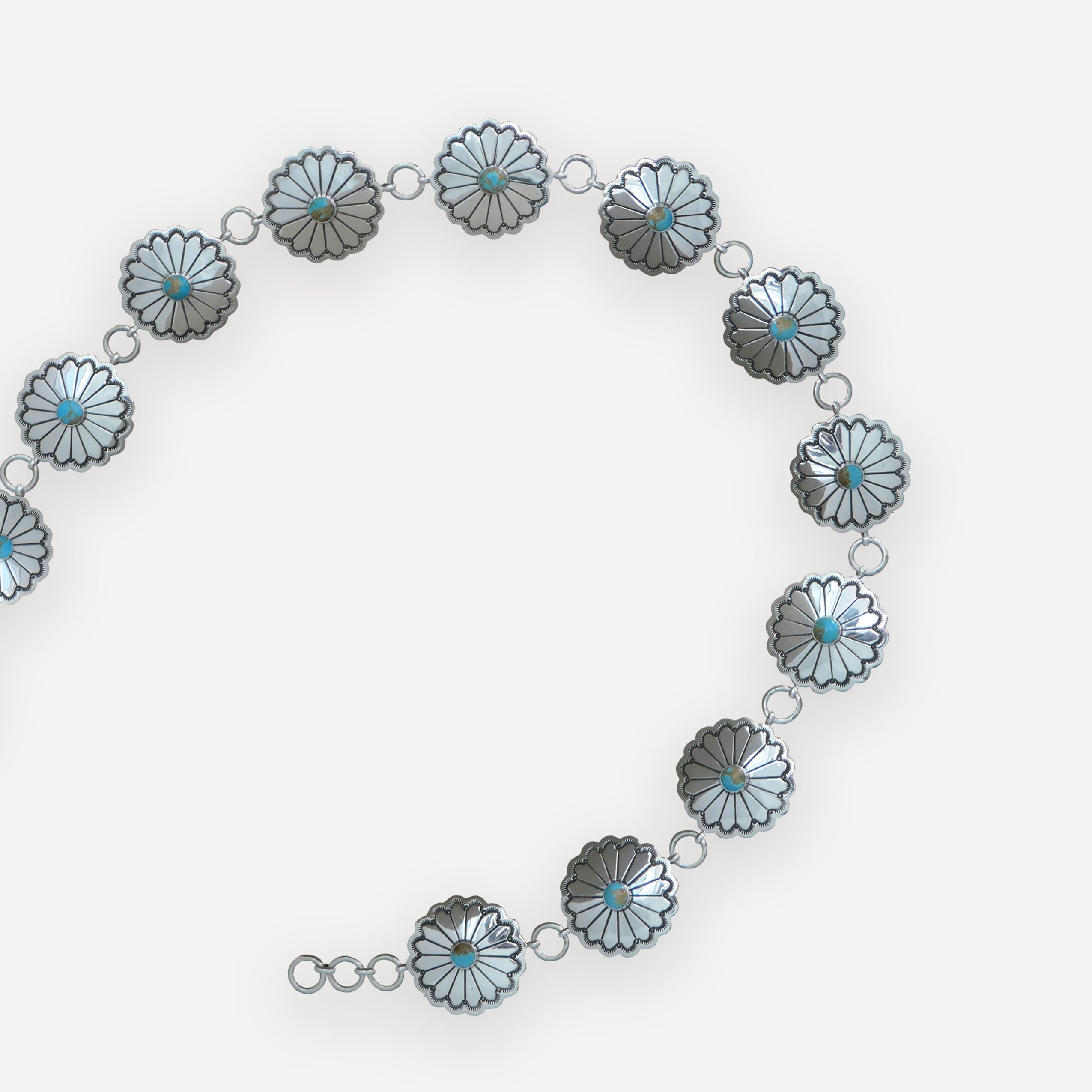 Sundance Concho belt by cowgirls & indians on white background 