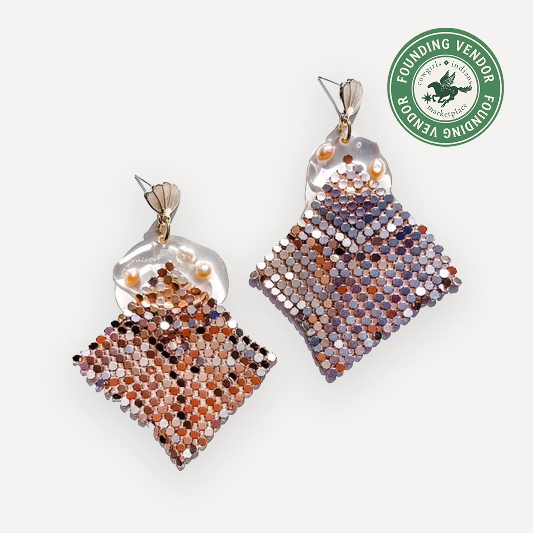 Pair of square-shaped earrings with multicolored pattern on a white background